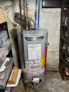 A.O. Smith ProLine gas water heater installed in a basement
