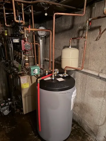 Indirect tank with circulator pumps, expansion tank and copper piping