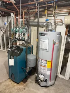 Boiler and gas water heater replaced side by side
